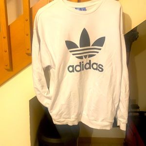 Woman’s Addidas Medium sweatshirt  with side pockets.
